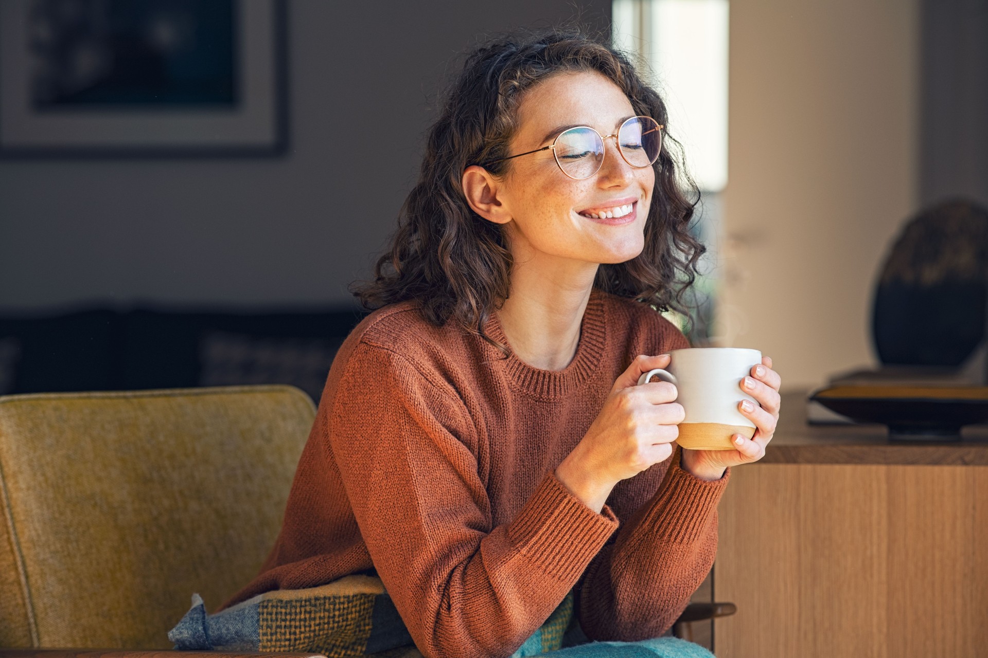 Beautiful woman relaxing and drinking hot tea Beautiful woman relaxing and drinking hot tea